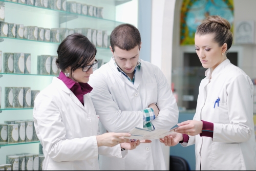 doctors looking at medical chart