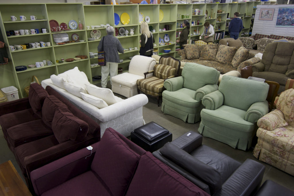 room full of couches and chairs