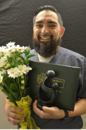 Anthony Rosas holding the Dasy award