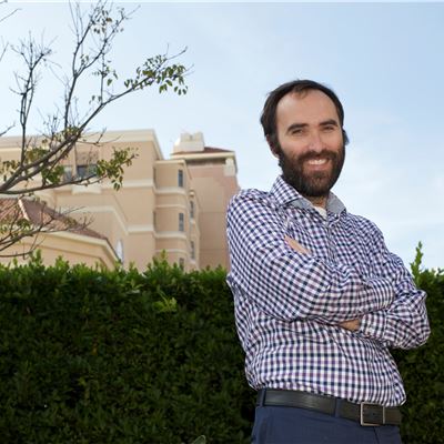 Patient story: Chris, standing outside huntington hospital