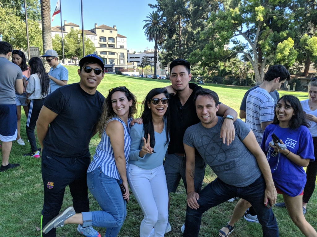 Several residents posing for a photo outside of the Huntington Hospital