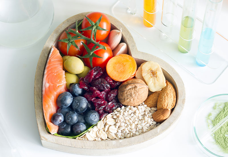 Heart shaped bowl with healthy foods