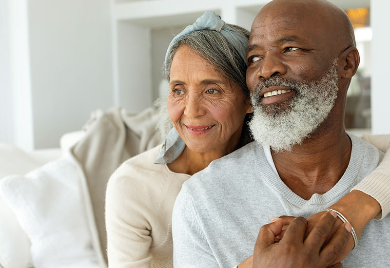 African American couple hugging