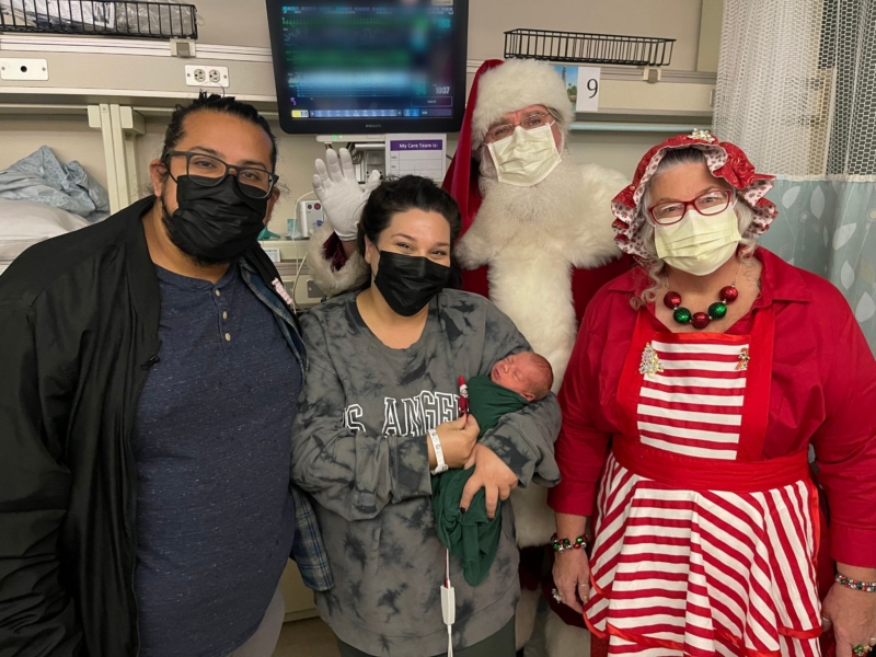 Huntington pediatric and NICU patients receive a special visit from Santa, with a little help from local police departments