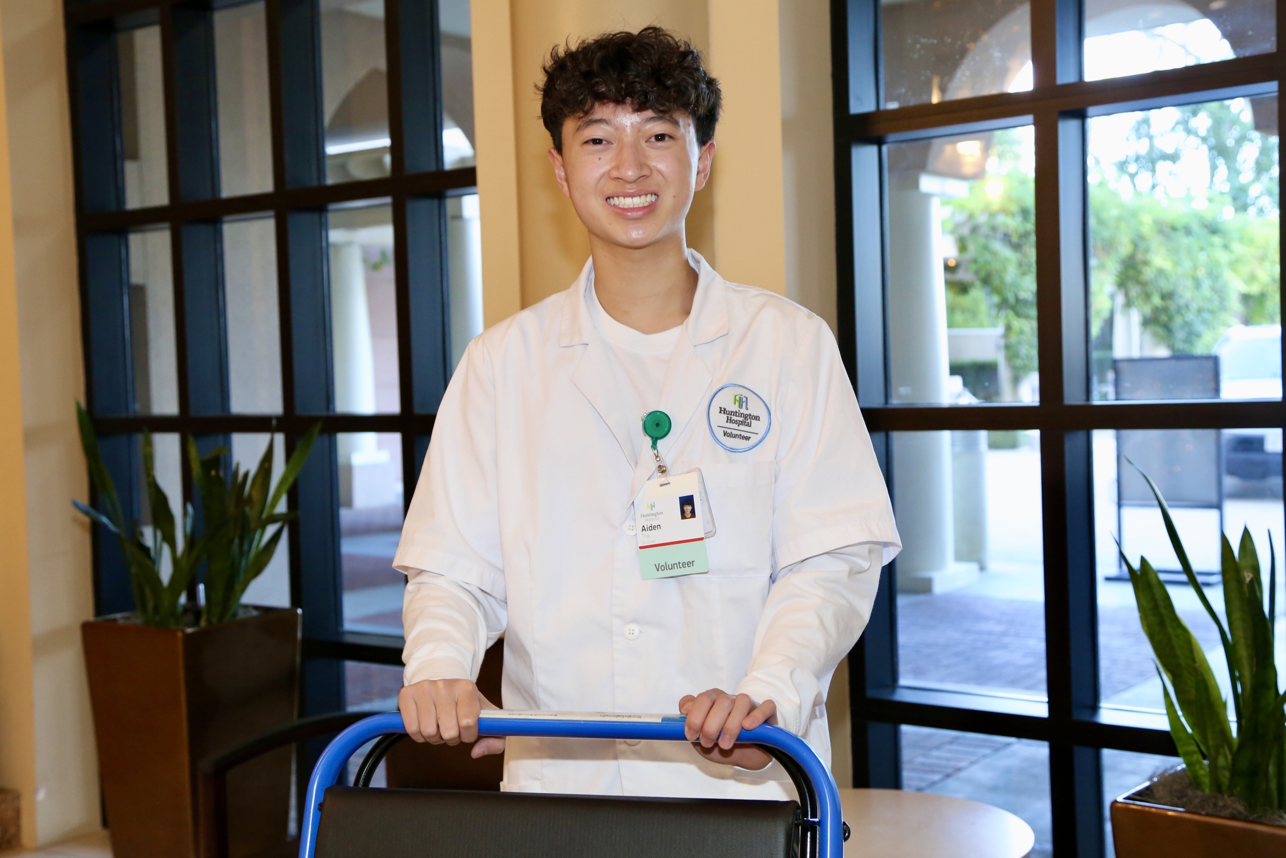 A smiling volunteer working.