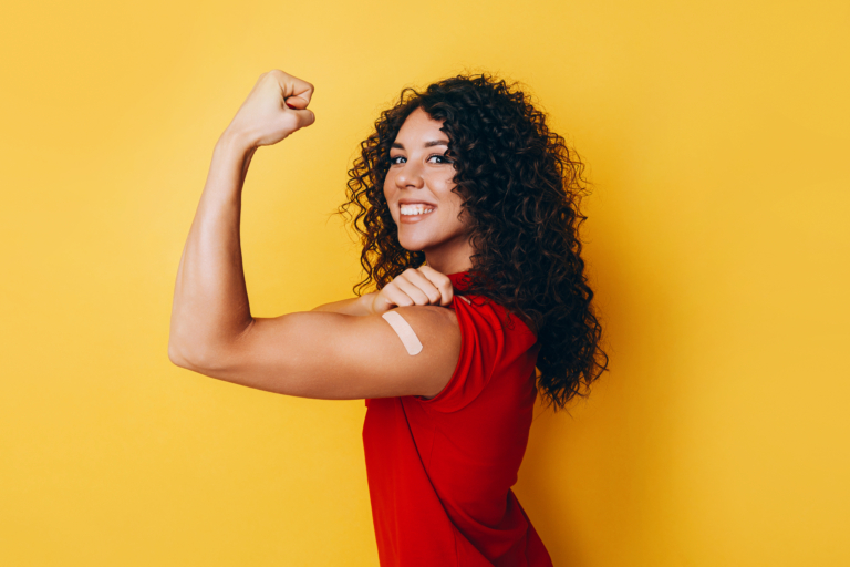 A,Black,African,American,Woman,Is,Vaccinated,Against,Covid,And