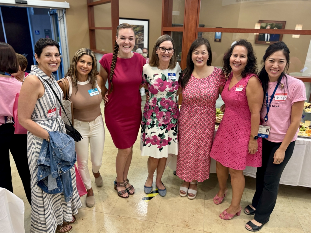 Attendees mingle with Cancer Center staff.