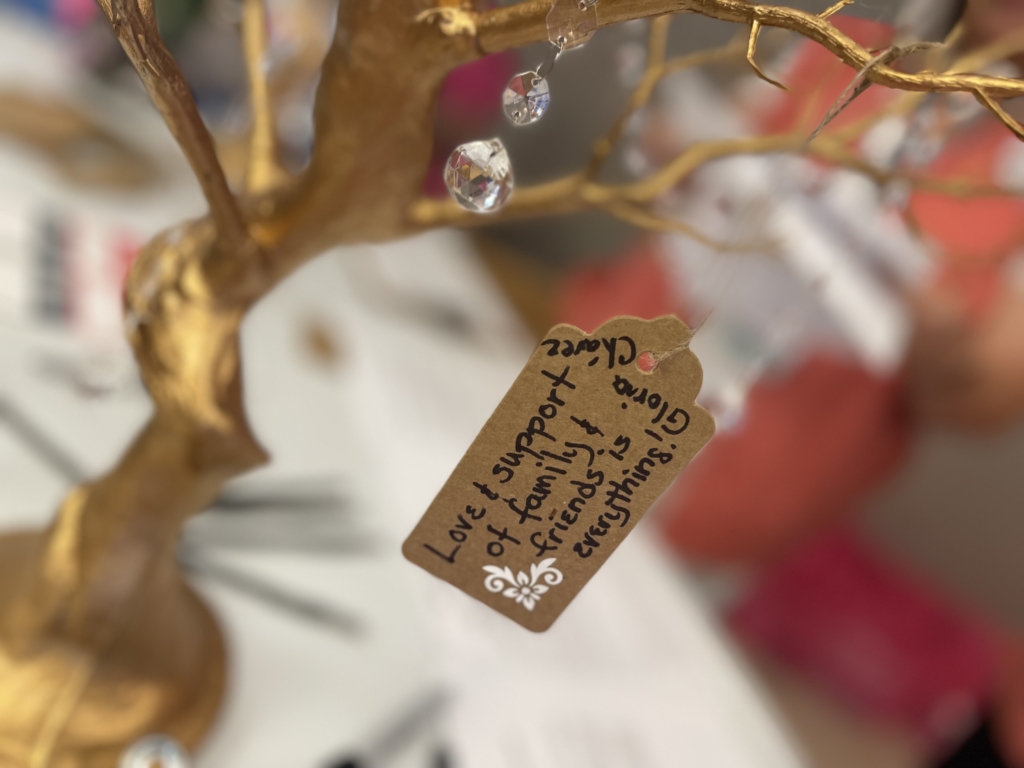 A message of strength hanging from the "Tree of Hope" displayed in the Huntington Cancer Center clinic.