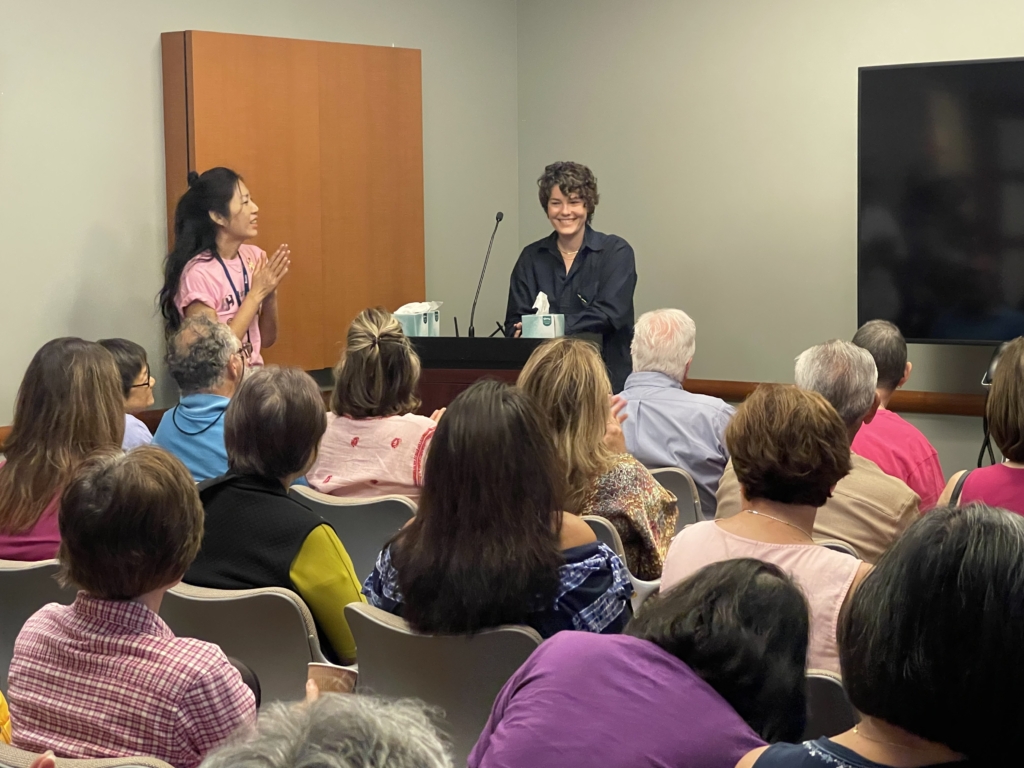 Huntington Cancer Center patient and independent filmmaker, Kailee McGee, receives applause after sharing her award-winning short film.